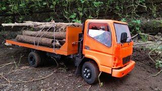 Canter Truck Loaded with Wood Almost Overturned