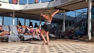 Drunk lady dancing by the pool onboard Celebrity Equinox November 3, 2018