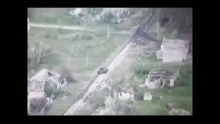 Ukraine - A Russian tank is destroyed at a crossroads by Ukrainian troops. Combat footage