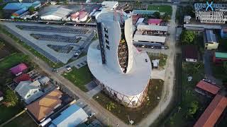 Flying near the Assuria high rise building in Paramaribo, Suriname.