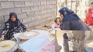 A busy day: Fatima's effort to meet expenses by baking bread. Building a house of hope