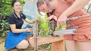 2 beautiful girls working as carpenters