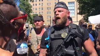 Armed militia, Black Lives Matter protesters collide in Louisville marches