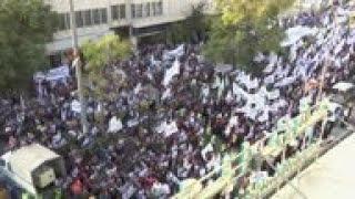 Protest in Hebron against Macron, cartoons