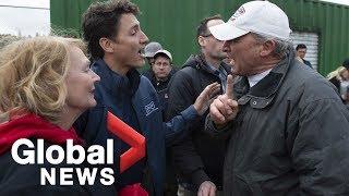 Volunteer berates Trudeau, accusing him of 'delaying' sandbag work