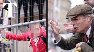 Protester throws object at Nigel Farage in Barnsley