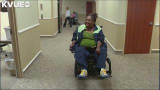 Previously paralyzed woman works in hospital she received help