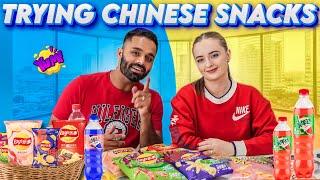 Trying CHINESE SNACKS for the first time ever 