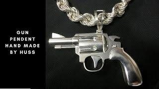 Gun pendent