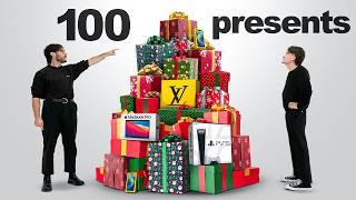 Opening 100 Christmas Presents!