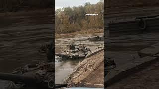 Russian tank destroyed by Ukrainian soldiers on a pontoon crossing #warinukraine #tanks #russia