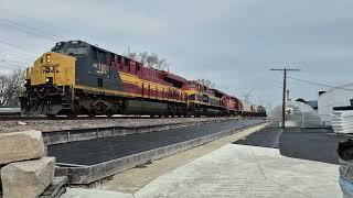 CSXT 1851 (NC&StL heritage) leads CPKC 246 in Northbrook and Des Plaines