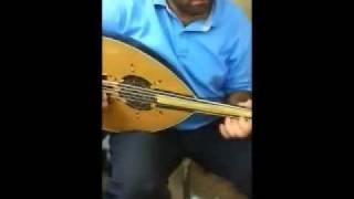 Oud Player Trying A New Nagham AL-Khaleej Oud