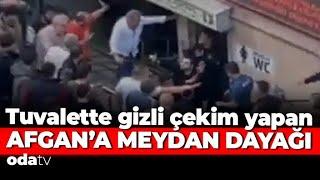 Tuvalette gizli çekim yapan Afgan'a meydan dayağı