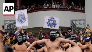 Fraternity members take part in a naked run to protest constitutional reform in Philippines