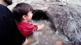 Noodling - Teaching 8yr old Son How to Noodle Catfish.  Catching Fish by Hand.