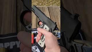 Custom Springfield 1911 Mil-Spec with Wilson Combat Parts at the range. 4K