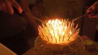 Lighting and blowing out 100 birthday candles