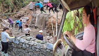 All the people finished building one side of the sewer wall, the girl carried materials.