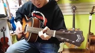 Guild M-240E Troubadour Acoustic-Electric Guitar demo at Basone Guitar Shop in Vancouver