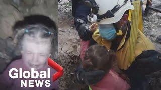 "I'm here, it's ok!": Emotional moment rescuers save little girl trapped in well in Aleppo