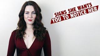 Signs she wants you to notice her!