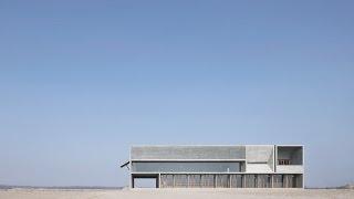 Vector Architects completes a seaside library with board-marked concrete walls