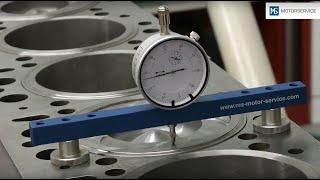 Measuring piston protrusion | With a dial gauge and measurement bridge