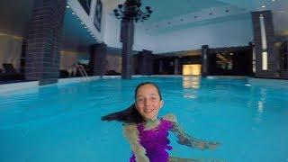 Swimming underwater in an indoor swimming pool
