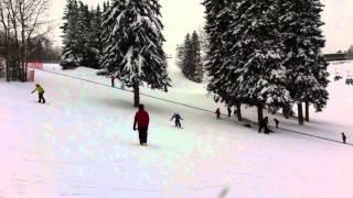 Michaela learning to snowboard