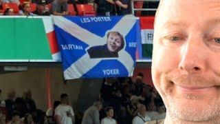 The boys at the Scotland game with the Limmy Yoker flag