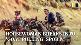 Horsewoman breaks into male-dominated Buzkashi - a ‘goat carcass pulling’ sport in Tajikistan