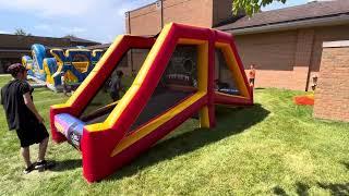 Inflatable crunch time football challenge