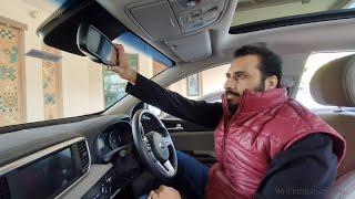 How to use auto dimming mirror in Kia Sportage