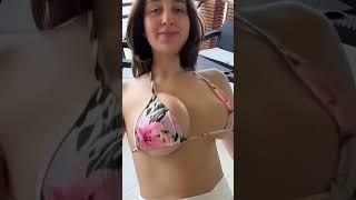 Girl swinging with big boobs