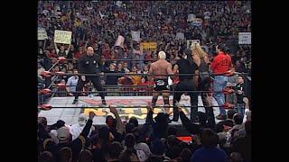 Goldberg confronts The nWo after the "Fingerpoke of Doom"