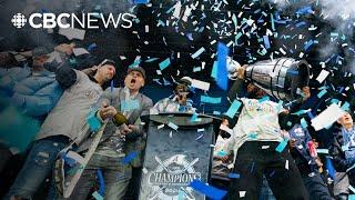 Argos fans and players celebrate Grey Cup win at lively rally in Toronto