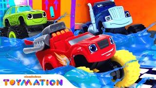 Blaze vs. Crusher in BLAZING Figure-8 Race!  | Blaze and the Monster Machines Toys | Toymation