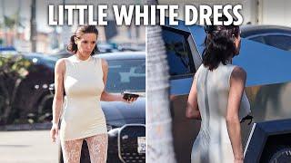 Bianca Censori looks uneasy as she tries to cover up in tiny dress on shopping trip without Kanye