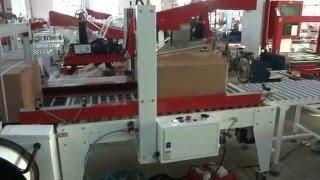 Integrated machine of folding,carton sealing and strapping,Qingdao Ausense