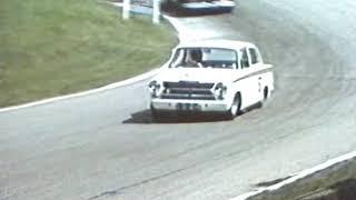 Jim clark driving his ford cortina rally car and touring car