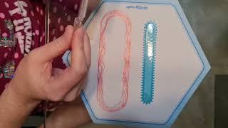 Double helix spirograph with twin mirrors designs