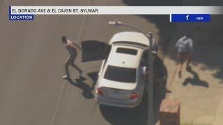 Pursuit suspects hide after ditching vehicle