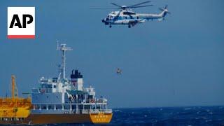 WATCH: Japanese Coast Guard rescues swimmer swept out to sea