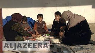 Iraqis return to towns captured from ISIL