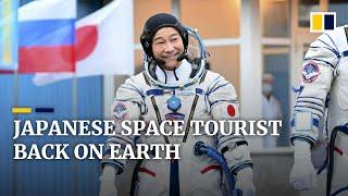 Japanese billionaire Maezawa returns to Earth after 12-day space tourism