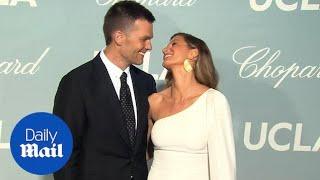 Tom and Gisele share the look of love on the red carpet