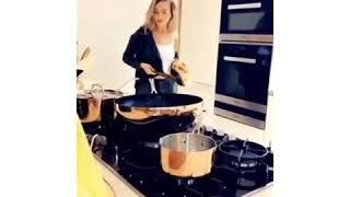 Perrie Edwards the only way to make dinner... make music! The concentration though 