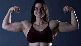 22 years old Wrestler Bianka flexing her biceps and mixed armwrestling