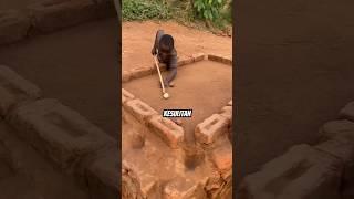 Anak Afrika bermain billiard dengan alat alat yang mereka buat sendiri